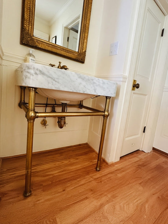 "Burnished Brass Console Sink: Why the Most Sophisticated Bathroom Finish in 2026 Isn't the One Everyone Is Talking About"